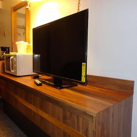 Tomahawk Motor Lodge Ривъртън Екстериор снимка
